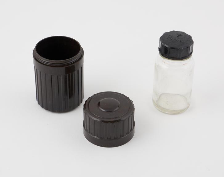 Small cylindrical container made of phenol formaldehyde