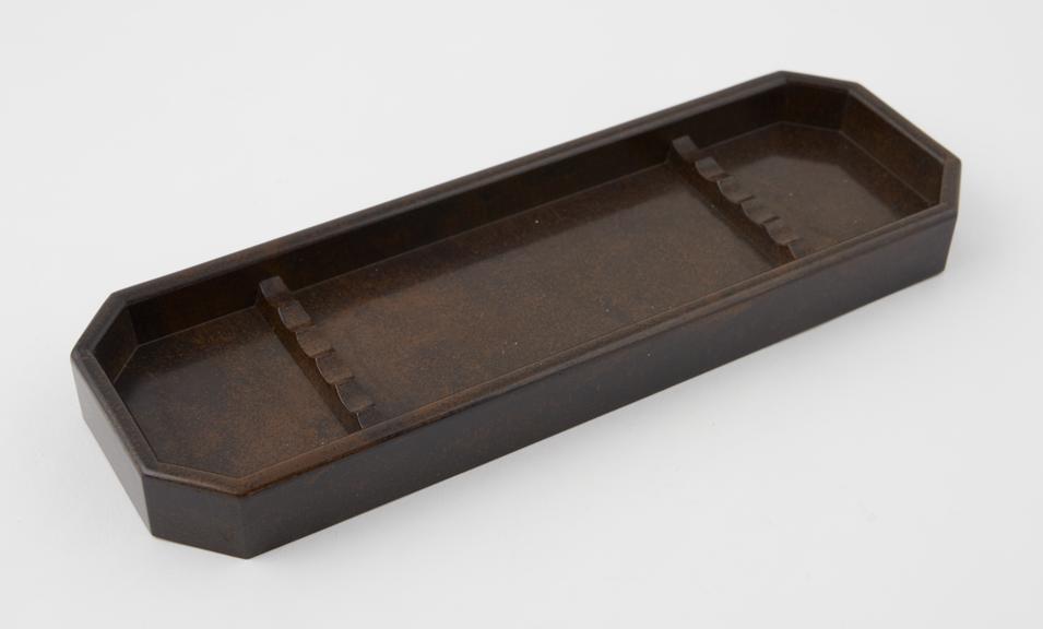 Small, hexagonal tray made of phenol formaldehyde, 1920-1940