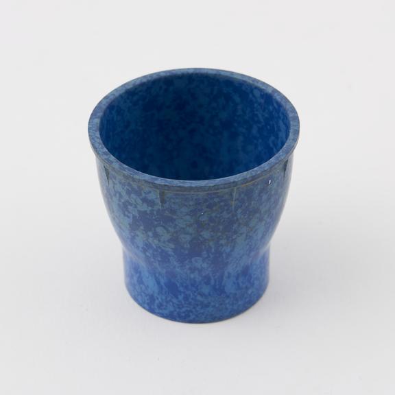 Egg cup, made of  mottled blue/light blue  urea formaldehyde