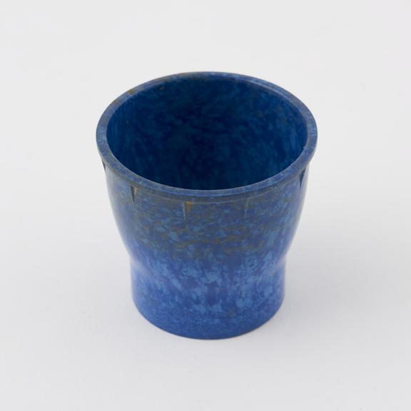 Egg cup, made of  mottled blue/light blue  urea formaldehyde