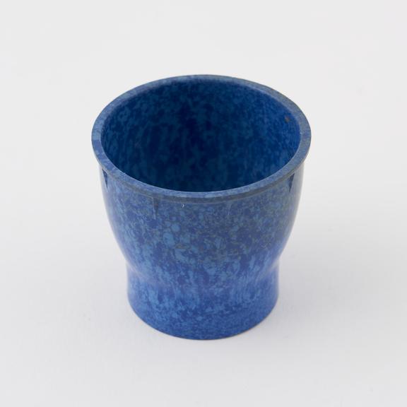 Egg cup, made of  mottled blue/light blue  urea formaldehyde