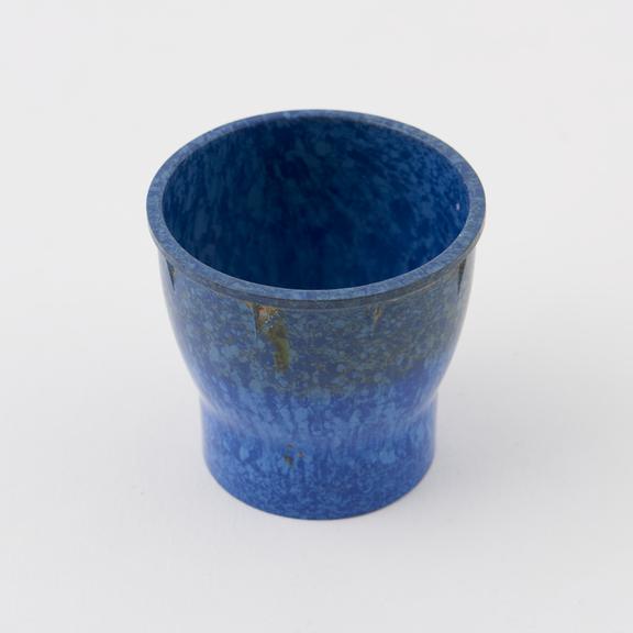 Egg cup, made of  mottled blue/light blue  urea formaldehyde