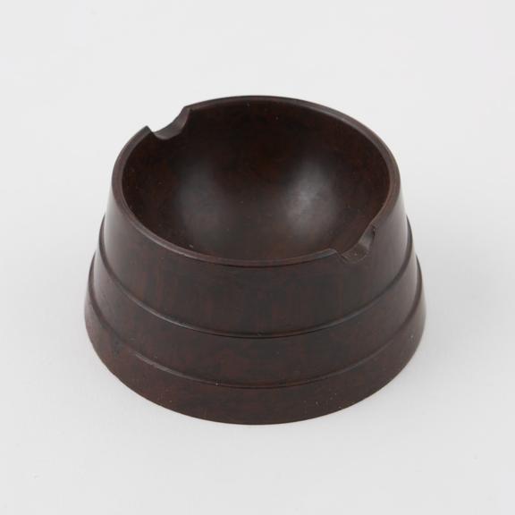 Ashtray made of dark brown phenolic