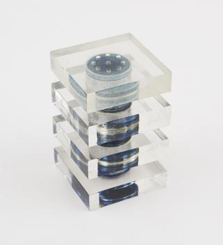 One of two perspex pepper pots