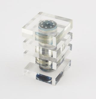 One of two perspex pepper pots