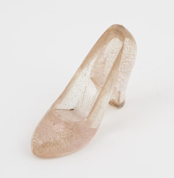 Model shoe of transparent pale pink acrylic flecked with gold