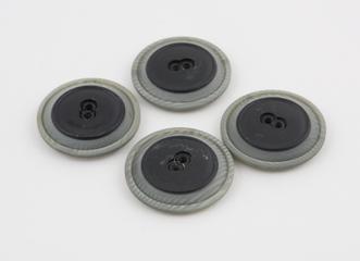 Four acrylic buttons