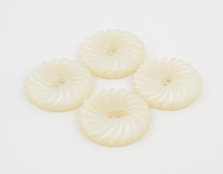 Four acrylic buttons