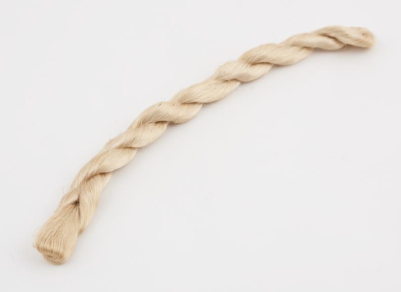 Skein of ivory viscose, plaited