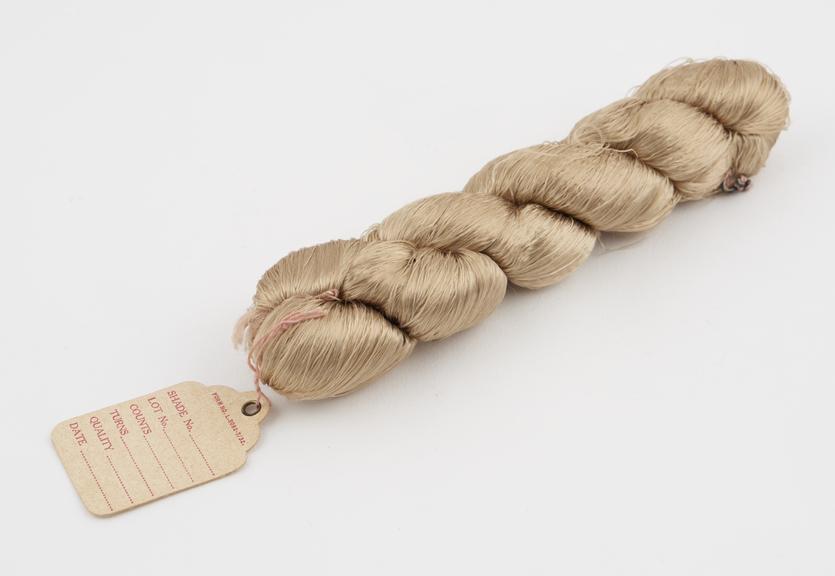 Caramel viscose skein labelled FORM NO.L.5092.7/32.....'.'