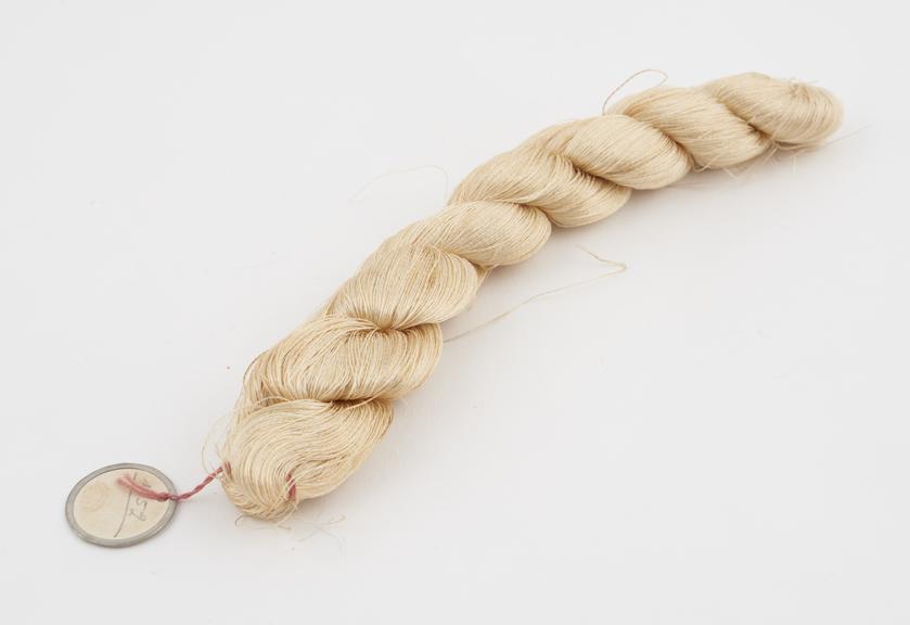 Old ivory viscose skein. Labelled  No.52' (pencil)