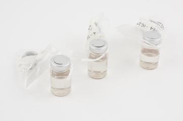 Three contact lens cases, barrel type
