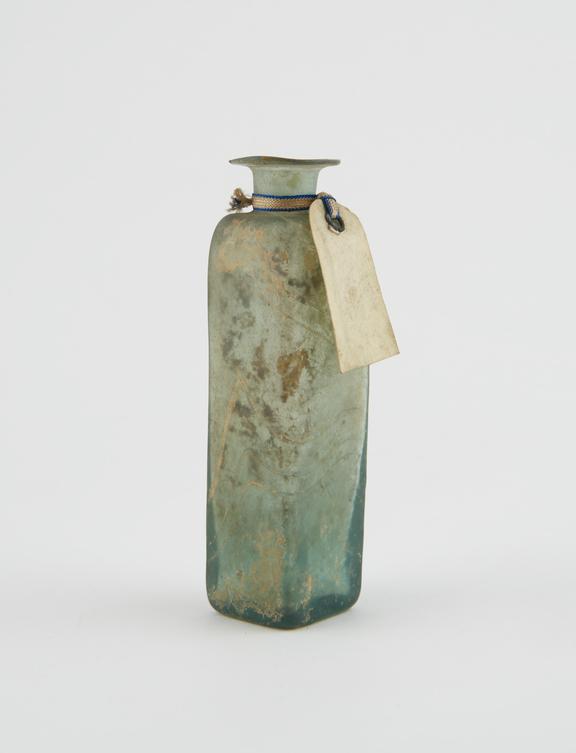 Medicine bottle, glass, green irridescent