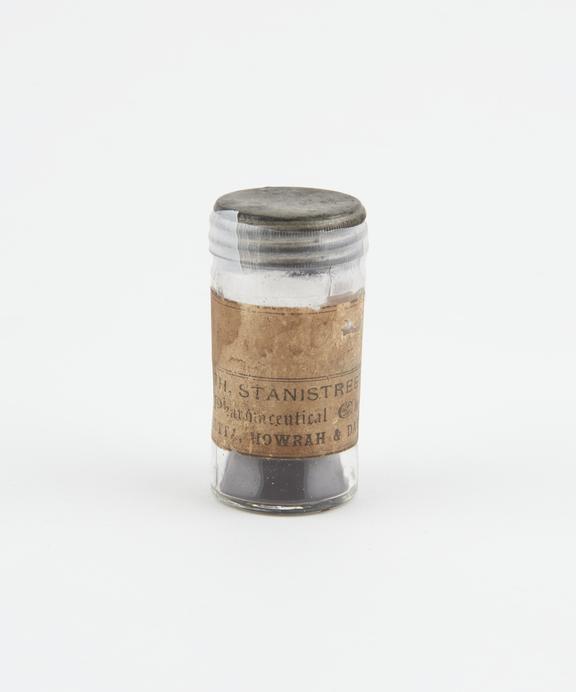 Small glass dispensing bottle, with metal screw top