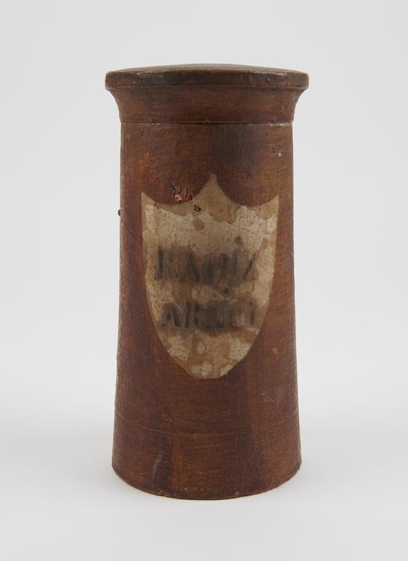 Wooden drug jar, used for arnica root, probably Swiss