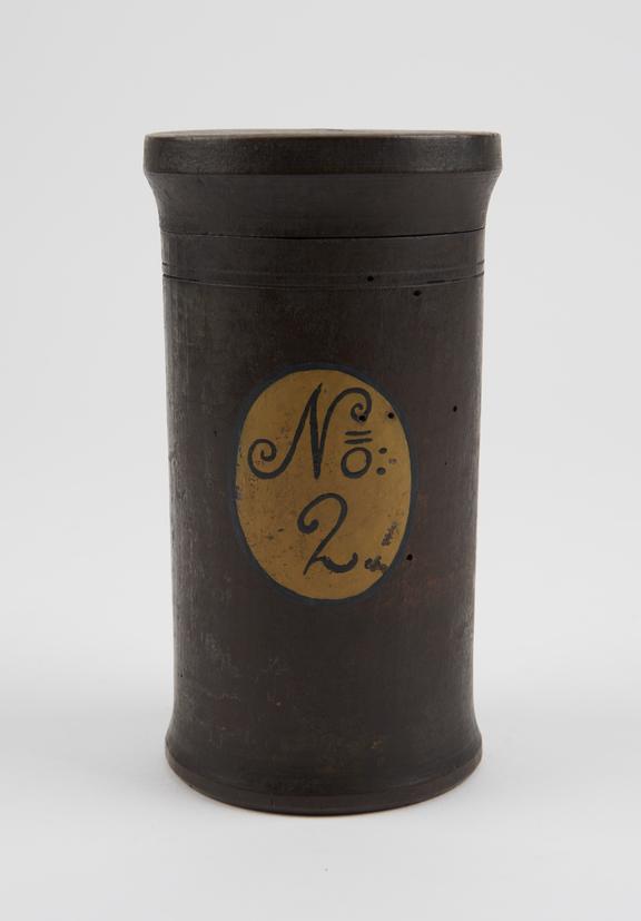 Turned wooden herb box, cylindrical, with lid, varnished