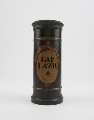 Cylindrical turned wooden herb box with circular lid