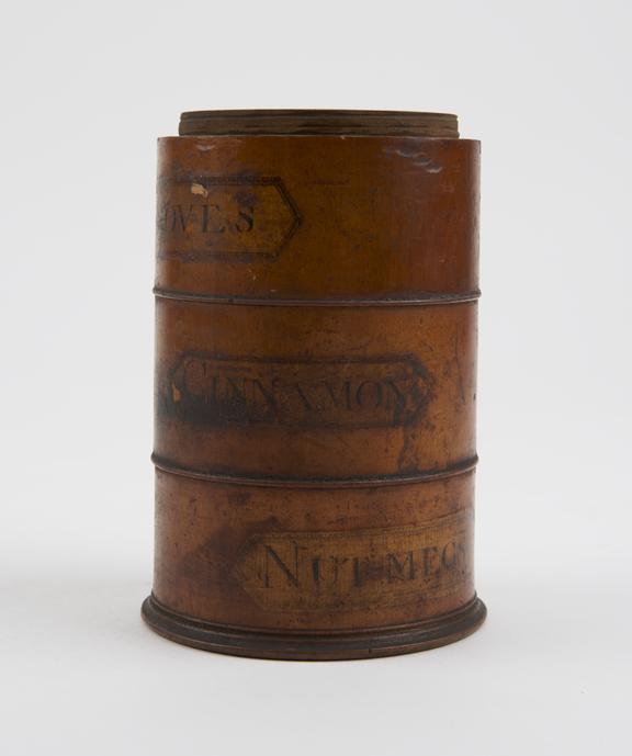 Cylindrical wooden spice box, three sections, top missing