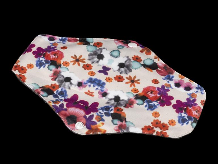 Nine reusable menstrual pads and carry case