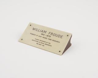 Plastic informational plaque for bronze portrait