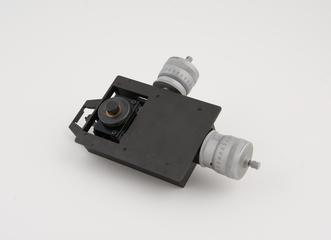 Micrometer measuring table in box.