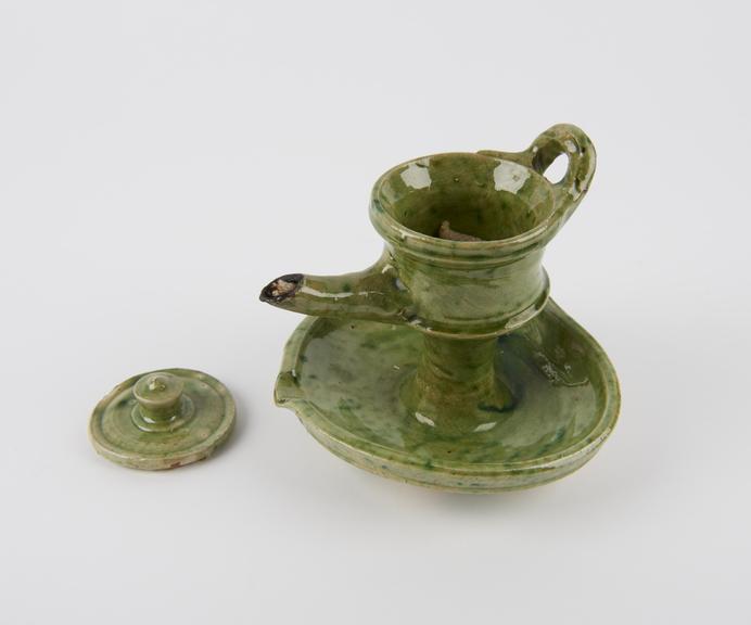 Green glaze pottery spout type lamp, N. Holland