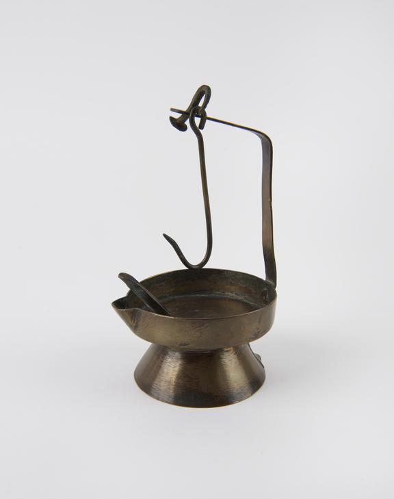 Brass lipped dish, with perforated wick support on stand