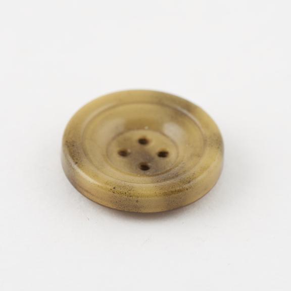 Circular cellulose nitrate covered steel button