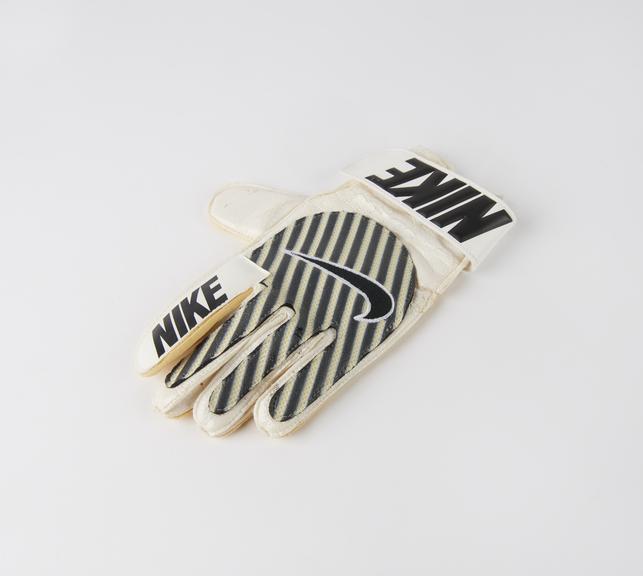 One of a pair of Goalkeeper gloves made by Nike (UK) Ltd.