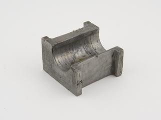 Silver metal end piece for Bodmer's travelling furnace-grate model