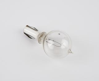 One of eighty-six early incandescent lamps.  Arch filament