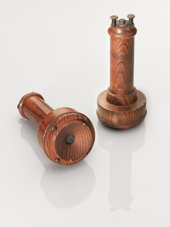 Two early 'butterstamp' telephone receivers with wooden handles