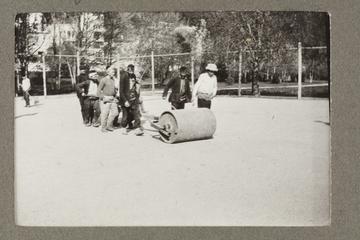 Rolling the Tennis Courts