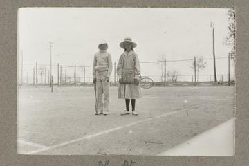 Untitled black and white photograph of H. H. Prince Nikita Alexandrovitch and Atia Staroselsky on the tennis court