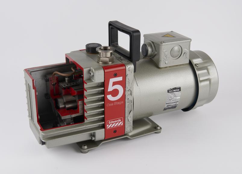 Rotary vacuum pump, one of four sectioned for display