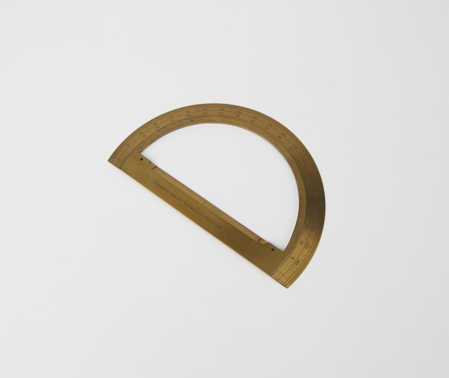 One of two brass 6-inch semi-circular protractor