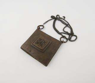 Rectangular brass amulet case