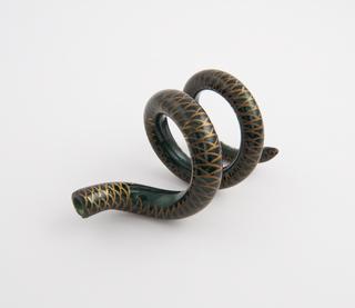 Detachable coiled snake from around an opal glass perfume bottle with gilt decoration