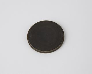 Circular disc, part of the Kelvin divided ring electrometer and gauge