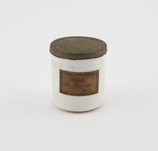 White ceramic pot with tin lid