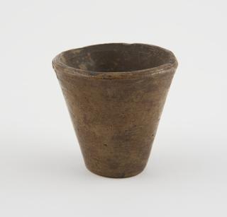 Brown glazed earthenware dispensing pot
