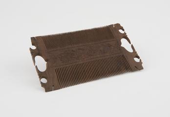 Carved wooden comb