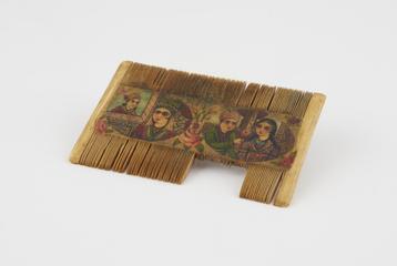 Double-sided ivory comb with painted centre panel