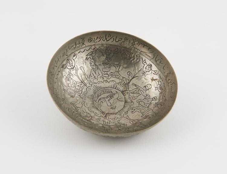 Small silver bowl with engraved figures, animals and birds