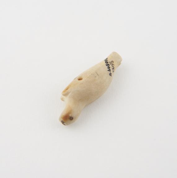 Ivory amulet, in the form of a seal, Eskimo, Alaska, U.S.A.