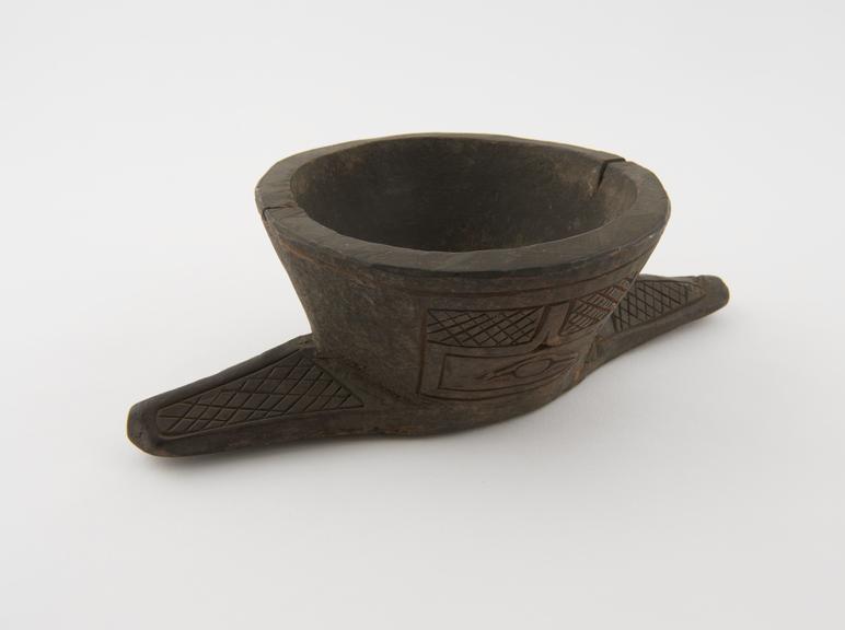 Carved wood mortar with two projecting handles