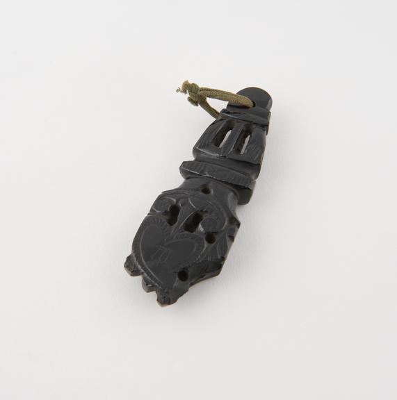 Jet amulet carved in the form of a hand