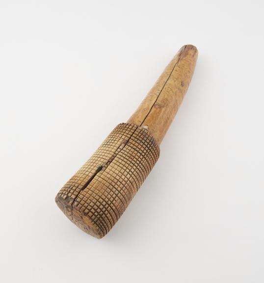 Ivory bark beater, possibly used as a pestle also