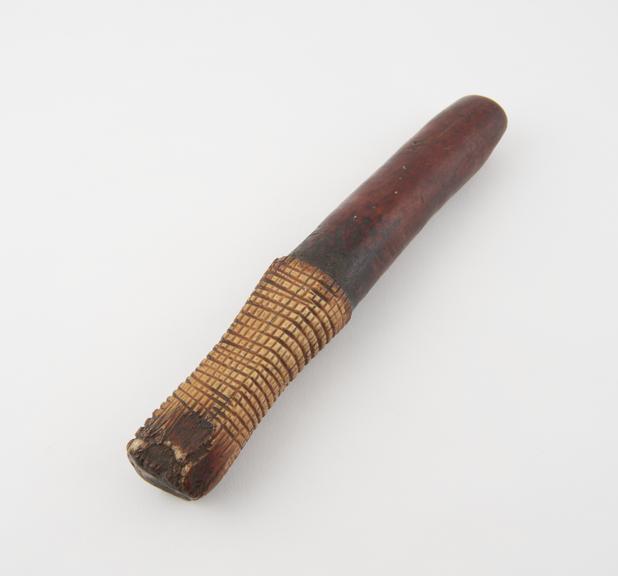 Ivory bark beater, possibly also used as a pestle.