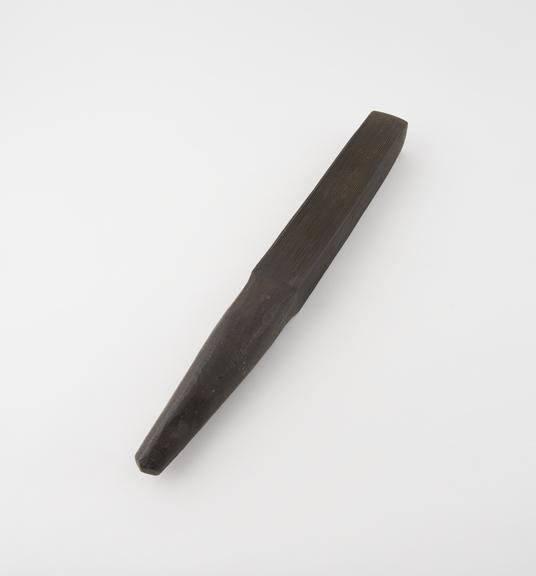 Wooden object, probably a bark beater